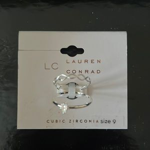 Lauren Conrad ring, two rings, silver in color, one ring as a cubic zirconia.